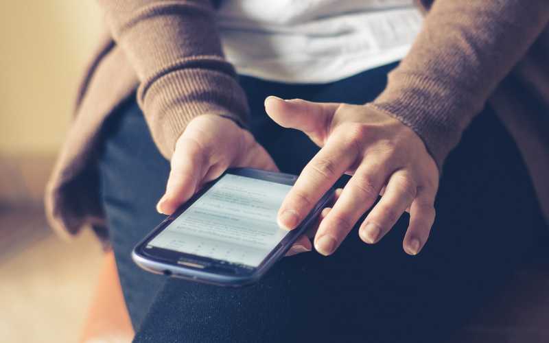 Woman holding phone