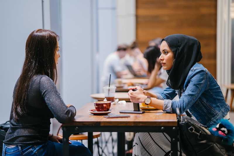 Women sitting talking