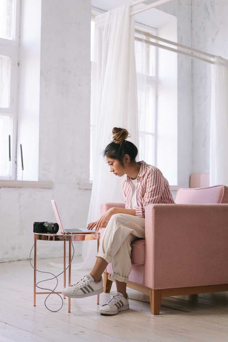 Woman looking at laptop